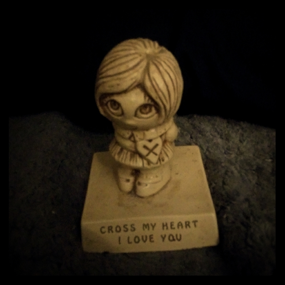 Vintage girl statue
